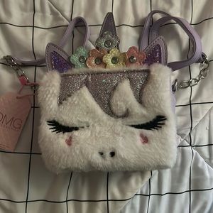 Unicorn purse with bracelet brand new never been used